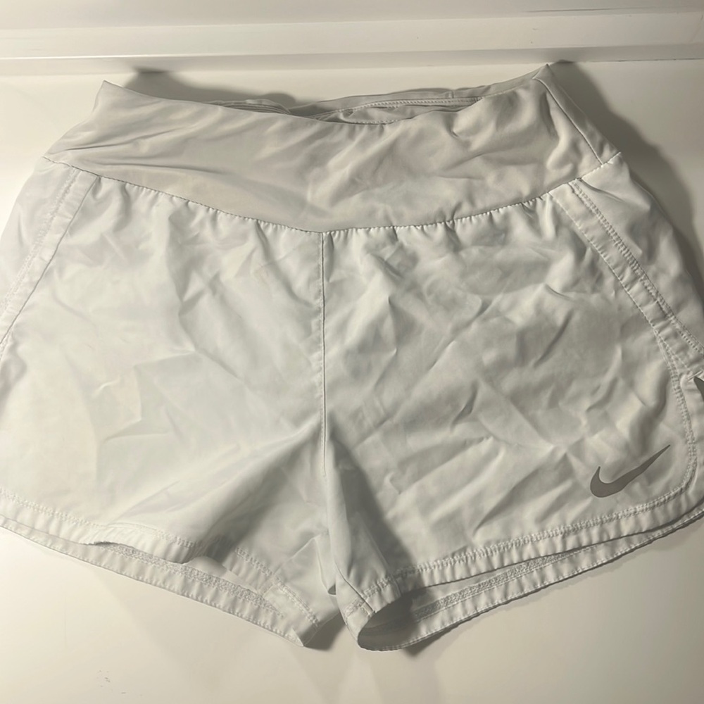 White Nike shorts